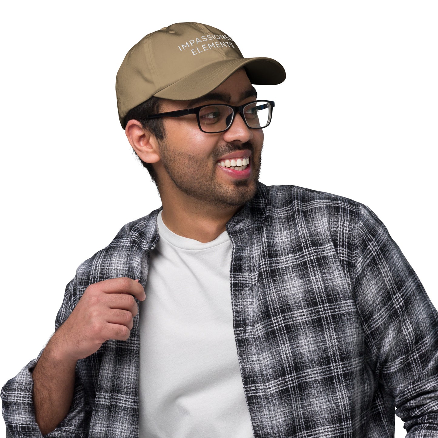 Male model gazing away happily while sporting the khaki Impassioned Elements embroidered cap