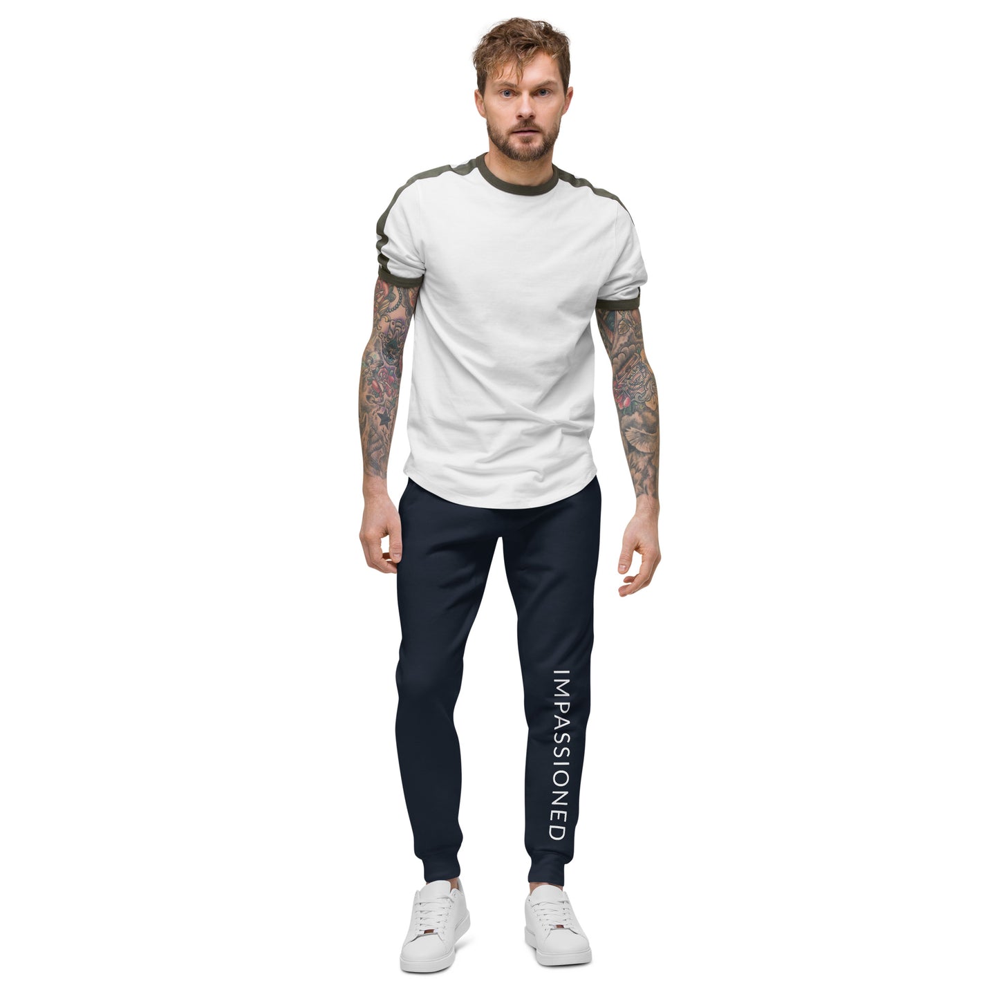 Tattooed man enthusiastically heading out in our Impassioned fleece jogger sweats tailored for a slim fit