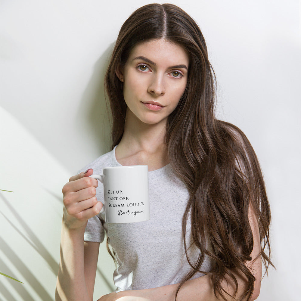 Mysterious female drinking from our motivational start again mug