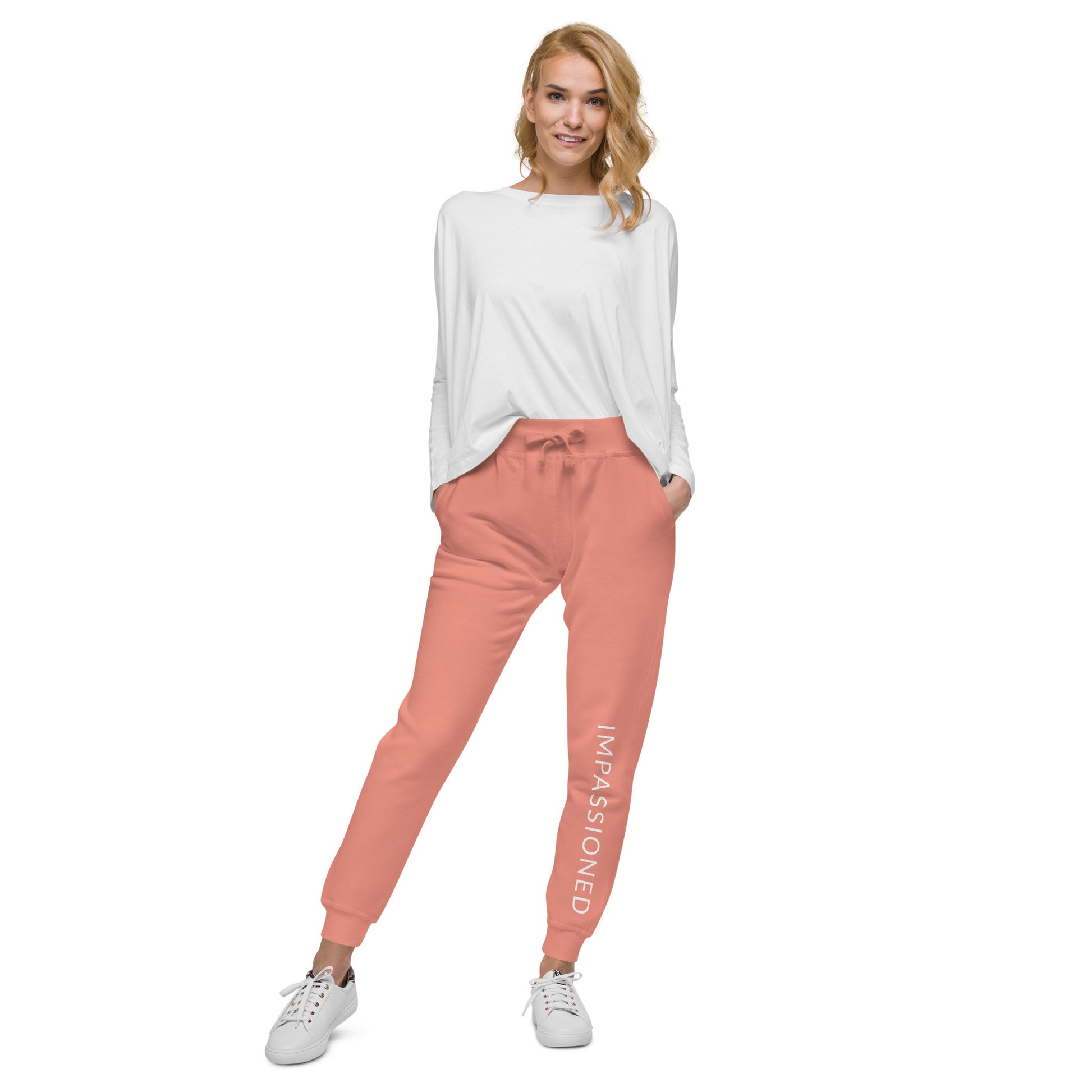 Happy model showing her fun spirit in dusty rose Impassioned fleece jogger sweatpants