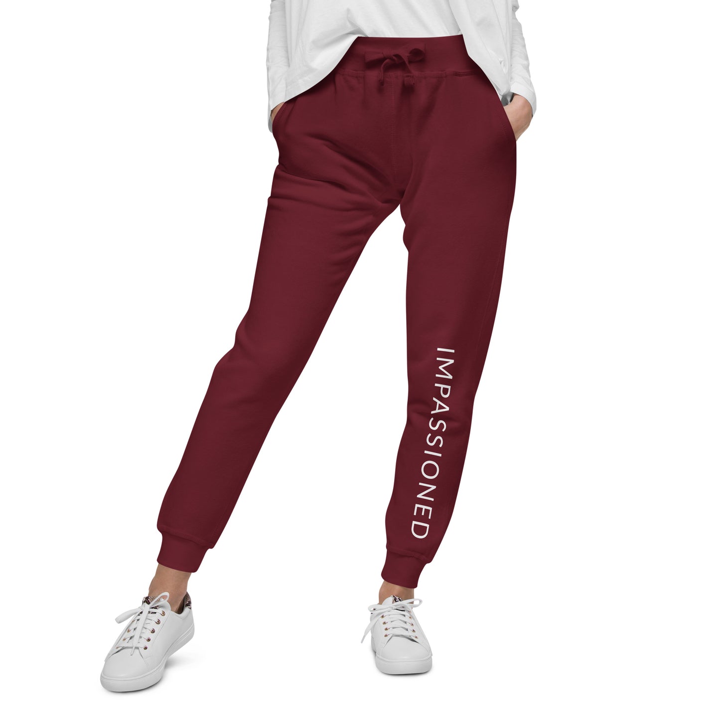 Woman modeling our premium unisex Impassioned fleece jogger sweatpants in maroon