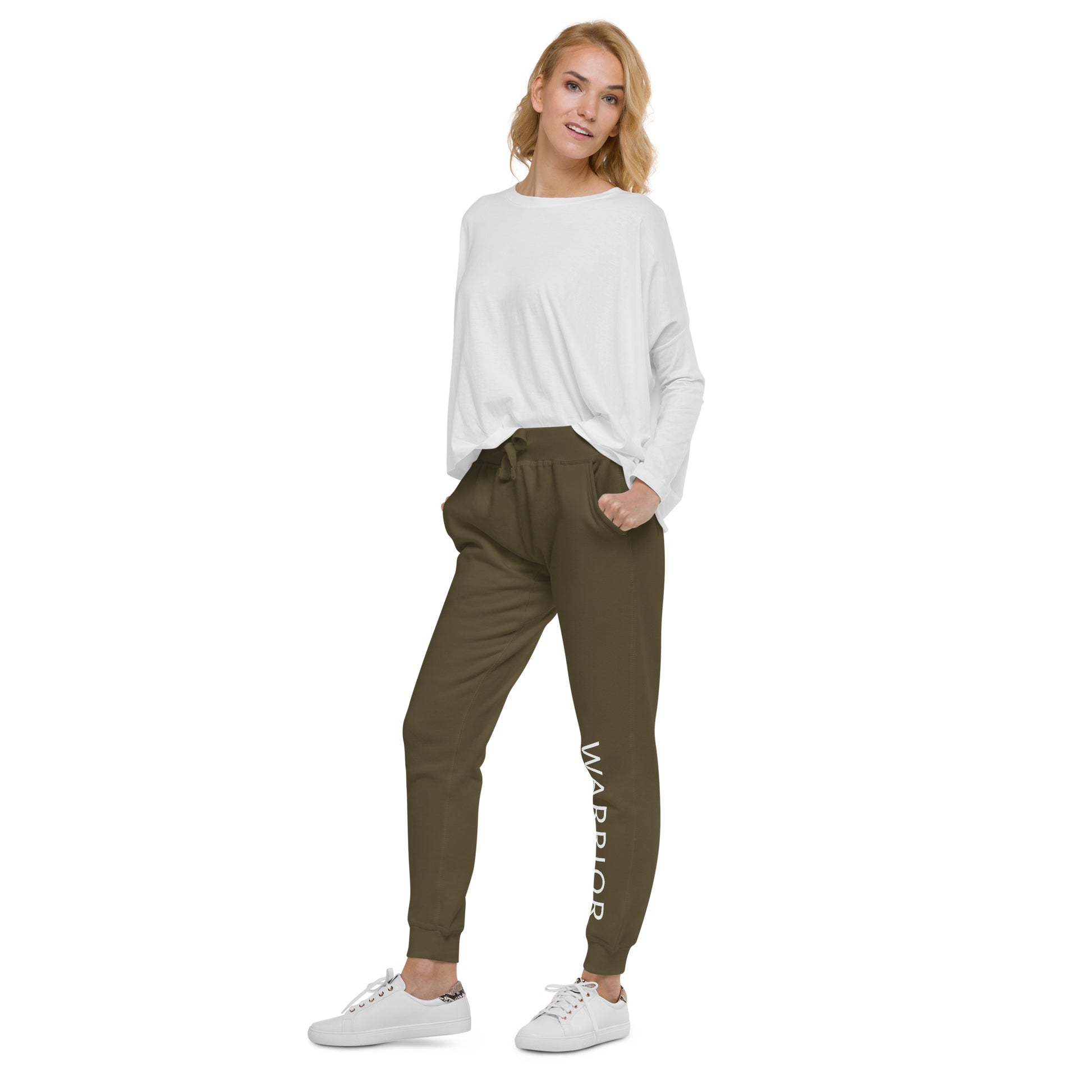 Happy female modeling showing off military green Warrior fleece jogger sweats