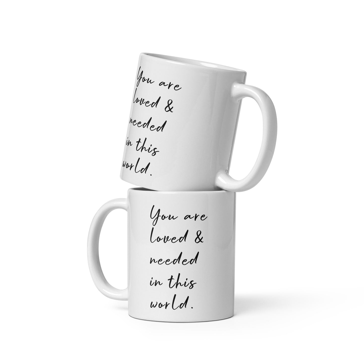 Stacked 11 oz ceramic mugs showing left and right side inspirational message You are loved and needed in this world