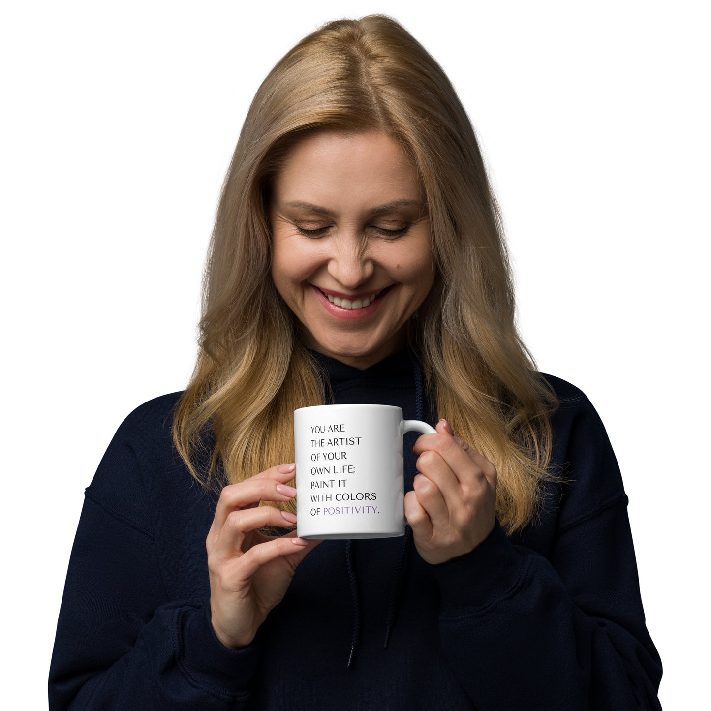 Vibrant woman smiling while holding her inspirational positivity mug for a mental health boost to start the day