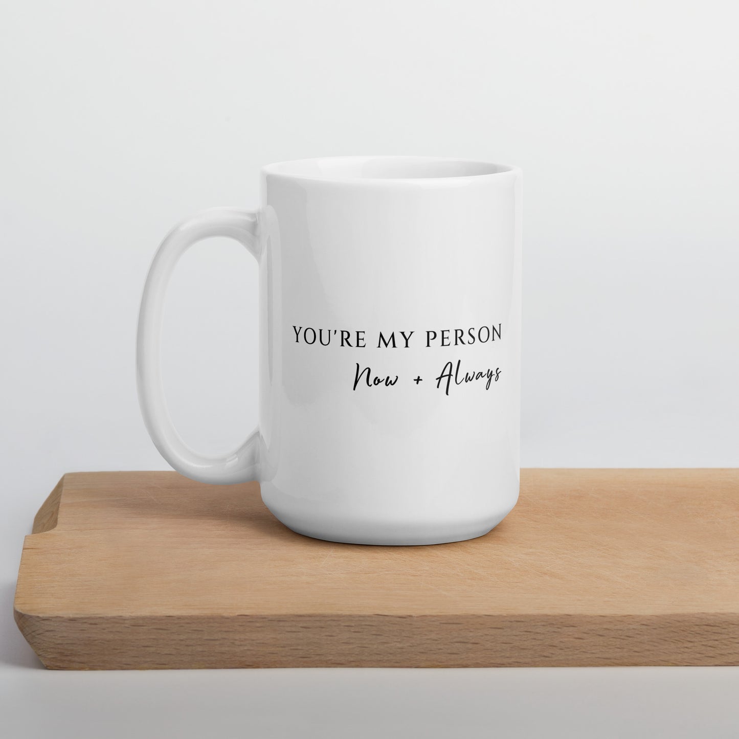 Minimalist and chic 15 oz You're My Person mug on wood chopping block